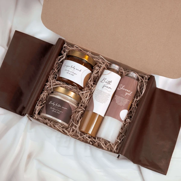 Pink spa box with sugar body scrub, body butter cream, bath foam and shower gel